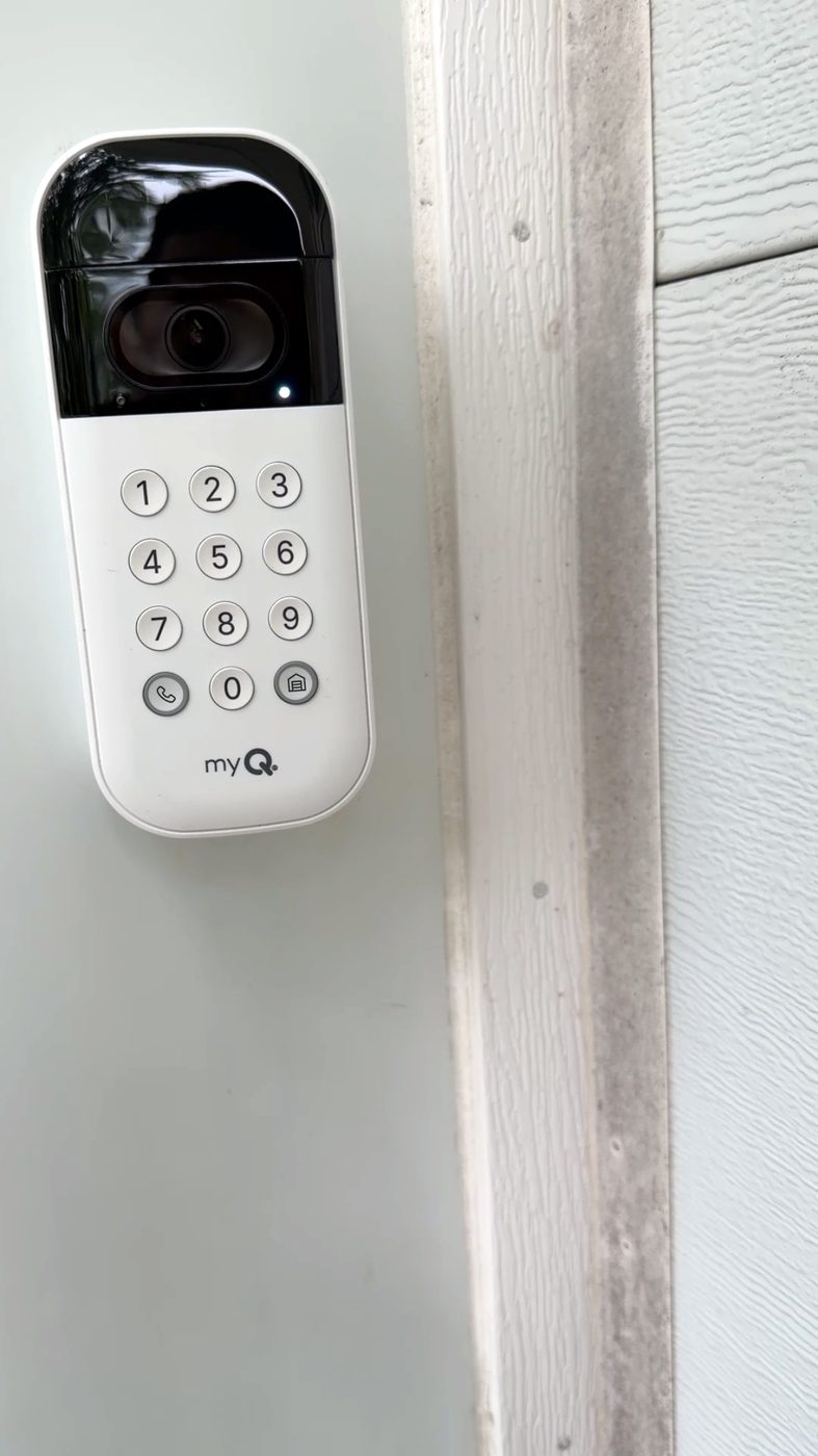 The same keypad from the approach — camera above, keys below