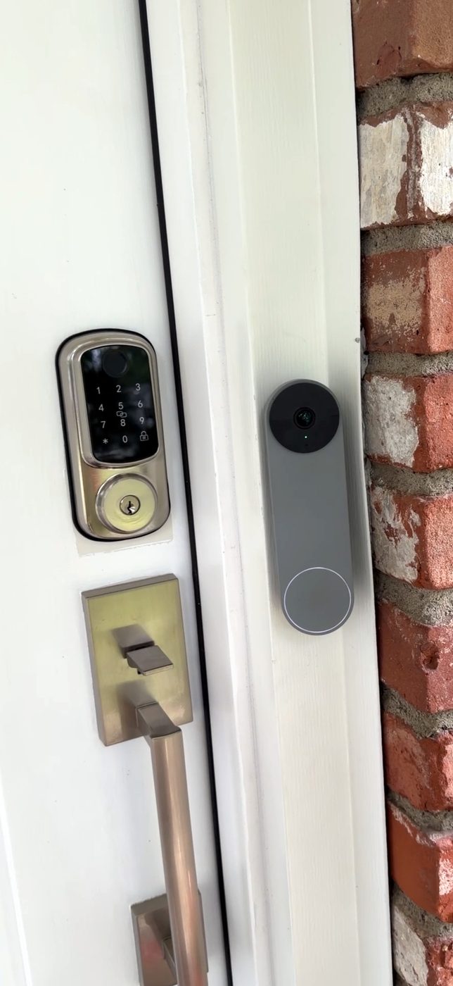 An MK-1 in satin nickel on a customer’s front door, above the matching handleset